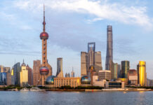 Shanghai skyline at the Bund with Oriental Pearl Tower downtown Pudong panorama in China