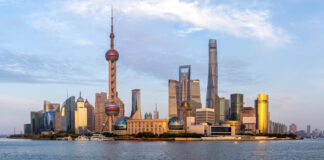 Shanghai skyline at the Bund with Oriental Pearl Tower downtown Pudong panorama in China