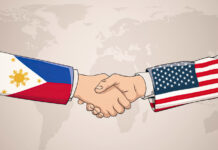 US-Philippines Officials shaking hands