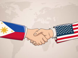 Development Should Guide US-Philippine Mutual Defense Treaty Review US-Philippines Officials shaking hands