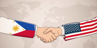 US-Philippines Officials shaking hands