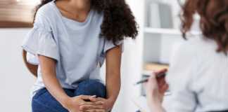 Anonymous photo of two women during group psychotherapy for people with depression