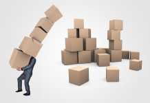 Why a Business Professional Needs a Brand Development Strategy Businessman Carrying Boxes