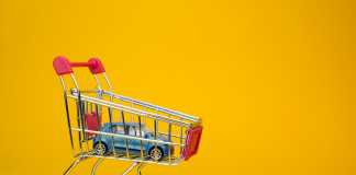 Tips for Reducing the Cost of Car Ownership blue car shopping cart