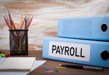 Here Are 8 Effective Ways To Choose The Right Payroll Service For Your Business Payroll, Office Binder on Wooden Desk