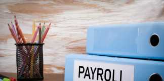Payroll, Office Binder on Wooden Desk