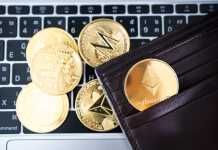 How to Organize Your Own Crypto Wallet Metal golden Ethereum in brown leather wallet on laptop keyboard background. Cryptocurrency concept.