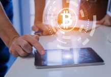 How Will Bitcoin Be Classified? People trading, investing, paying with bitcoin cryptocurrency, BTC symbol, tablet