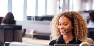 5 Tips for Setting up International Customer Support Young Businesswoman Wearing Telephone Headset Talking To Caller In Customer Services Department