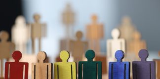 5 Reasons You Should Use A Global Talent Network for Recruitment Wooden little men in lgbt colors closeup