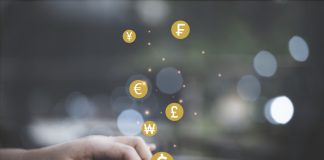 How to Use Moving Average Convergence Divergence (MACD)? Hand using smartphone with currency icon include dollar Yen yuan Euro and Pound sterling for internet banking and trading currency exchange or forex concept.