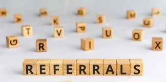 referrals - word from wooden blocks with letters