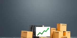 Forklift near boxes and easel with green arrow up. Growth trade and production rates, increased sales. High import export. Economic growth, industry development. Marketing, price increases.