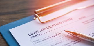 Loan application form with pen on paper / financial loan negotia