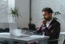 Navigating the Search for an Ideal Military Lawyer A Man in Maroon Suit Sitting at the Table