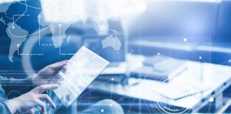 Man with futuristic digital tablet on a project