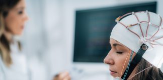 Female Patient in a Neurology Lab doing EEG Scan