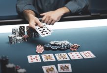 Man playing Texas Hold 'em poker at Casino