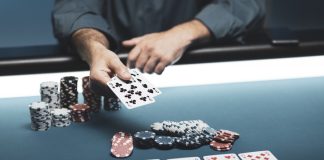 Man playing Texas Hold 'em poker at Casino
