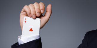 Man is hiding an Ace in the sleeve