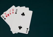 What is The Most Trusted Online Casino in Canada? Playing cards on a dark background, games of chance