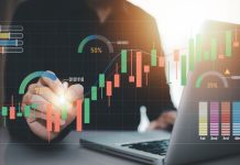 Businessman interacting with laptops, phones, and tablets with featuring stock tickers or graphs, cryptocurrency and new trading platforms, ideas and perspectives, Stock investment,New technology