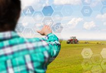 Farmer manages planting on the virtual screen.