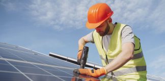 man on solar panel