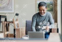 The Path to E-commerce Success: Choosing the Right Software Development Partner man using Laptop and credit card payment shopping online with icon customer network connection on screen and connecting with omni channel system.