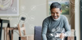 man using Laptop and credit card payment shopping online with icon customer network connection on screen and connecting with omni channel system.