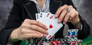 woman playing poker at casino