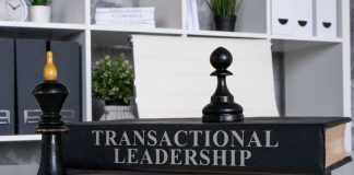 Chess piece and book of transactional leadership