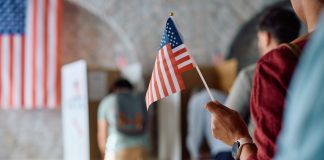 US flag holding by a woman