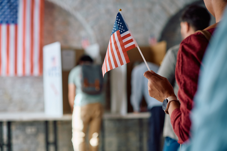 US flag holding by a woman