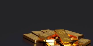 Gold bars on black background