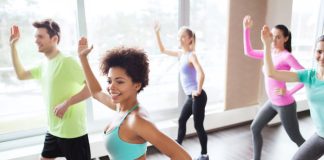 Group of people dancing in gym
