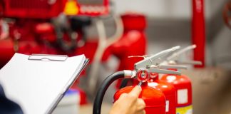 Engineer checking Industrial fire control system,Fire Alarm controller, Fire notifier, Anti fire.System ready In the event of a fire.
