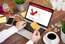 Woman buying heels and paying online
