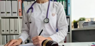 Judge gavel and court doctor stethoscope and doctor writes