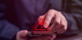 People with warning notification and spam message icon on mobile phone, Spam link on smartphone, Virus on smartphone, Alert warning scam, Hacker