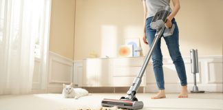 woman using a vacuum cleaner
