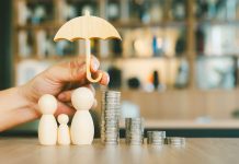 Umbrella icon and family model, Security protection and health insurance. The concept of family home, protection, health care day, car insurance.