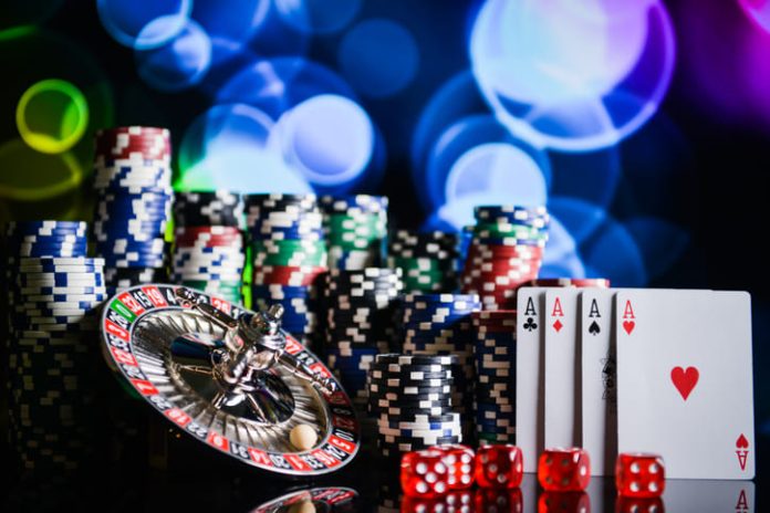 casino roulette, playing chips and card