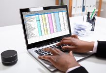 The Benefits of Switching to Managed Accounting Services in a Digital Age Accountant examining report