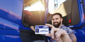 Truck driver showing his driver license