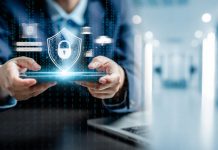 businessman holding a tablet for financial security