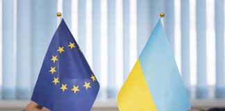 Political flags of Ukraine and European Union
