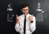 Happy businessman in white shirt showing thumb up gesture with two hands