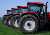 wheeled tractor on a green grass