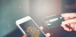 Online banking businessman using smartphone with credit card